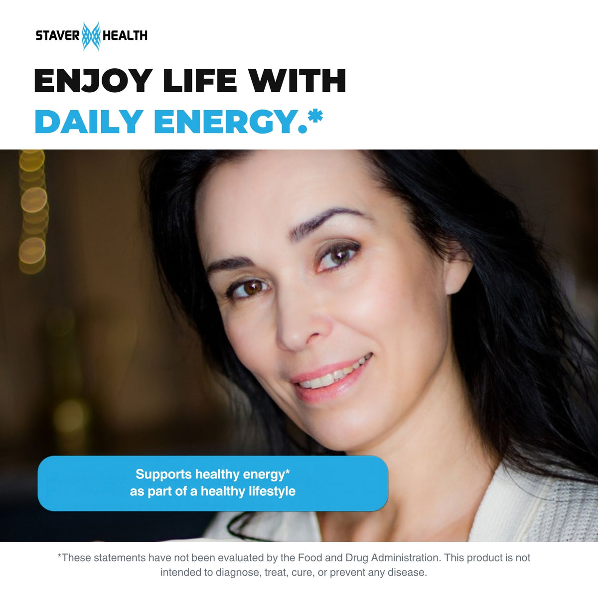 Smiling woman with long dark hair at home, looking at the camera