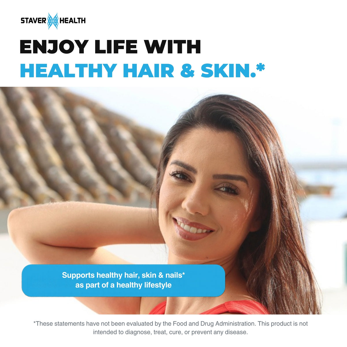 Smiling woman with long, shiny brown hair on a sunny day